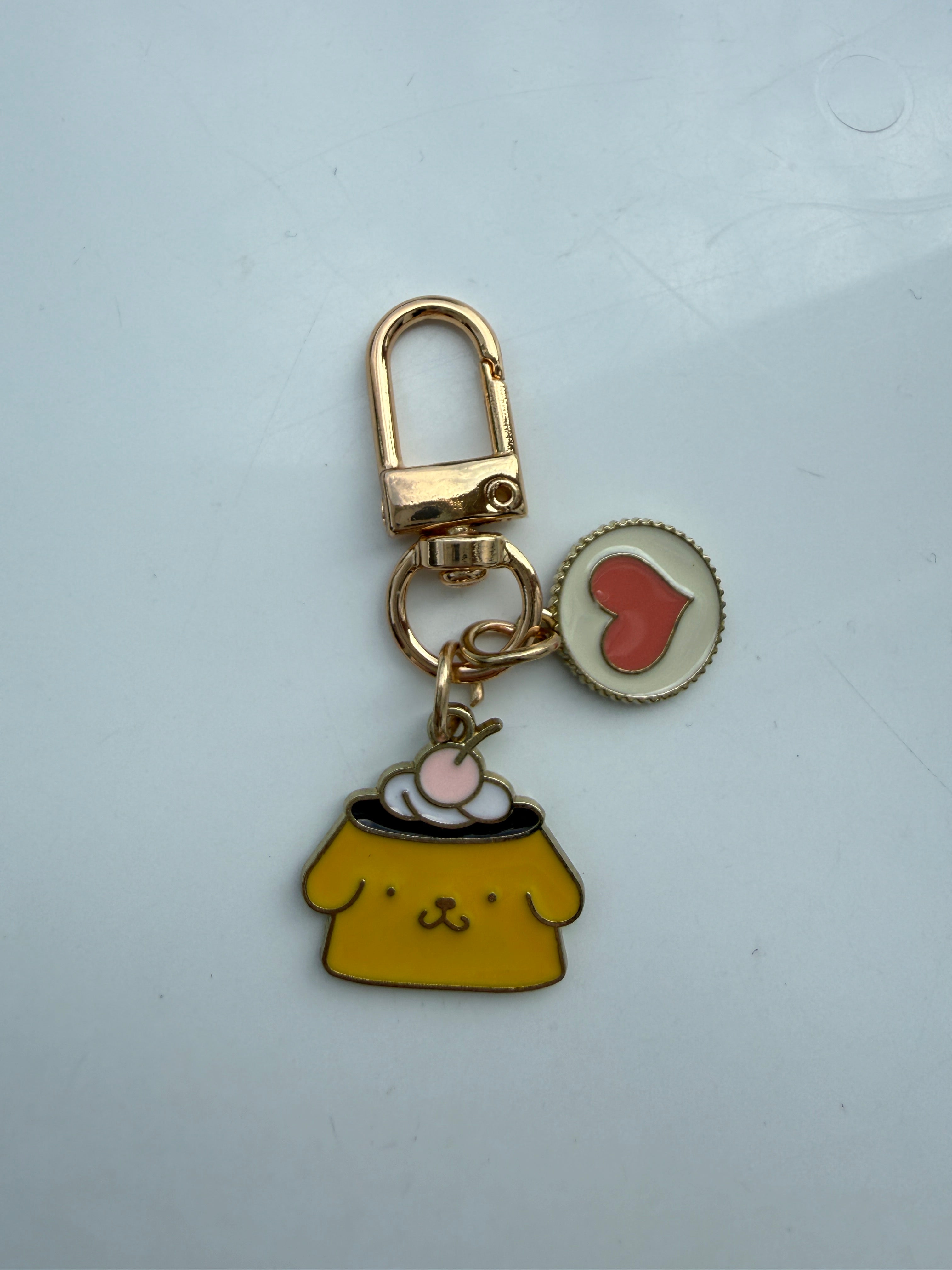 Handmade Kawaii Sanrio themed keyring, gold coloured enamel Keyring