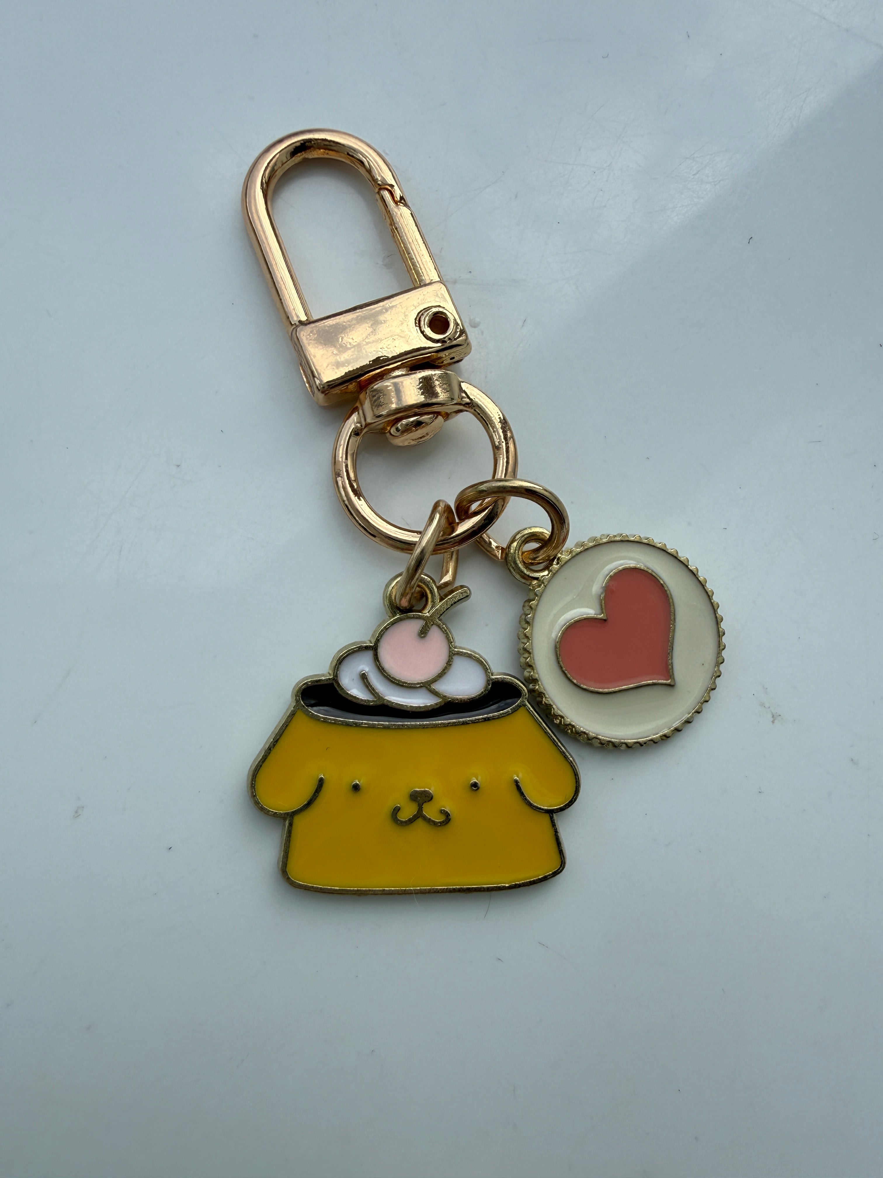 Handmade Kawaii Sanrio themed keyring, gold coloured enamel Keyring